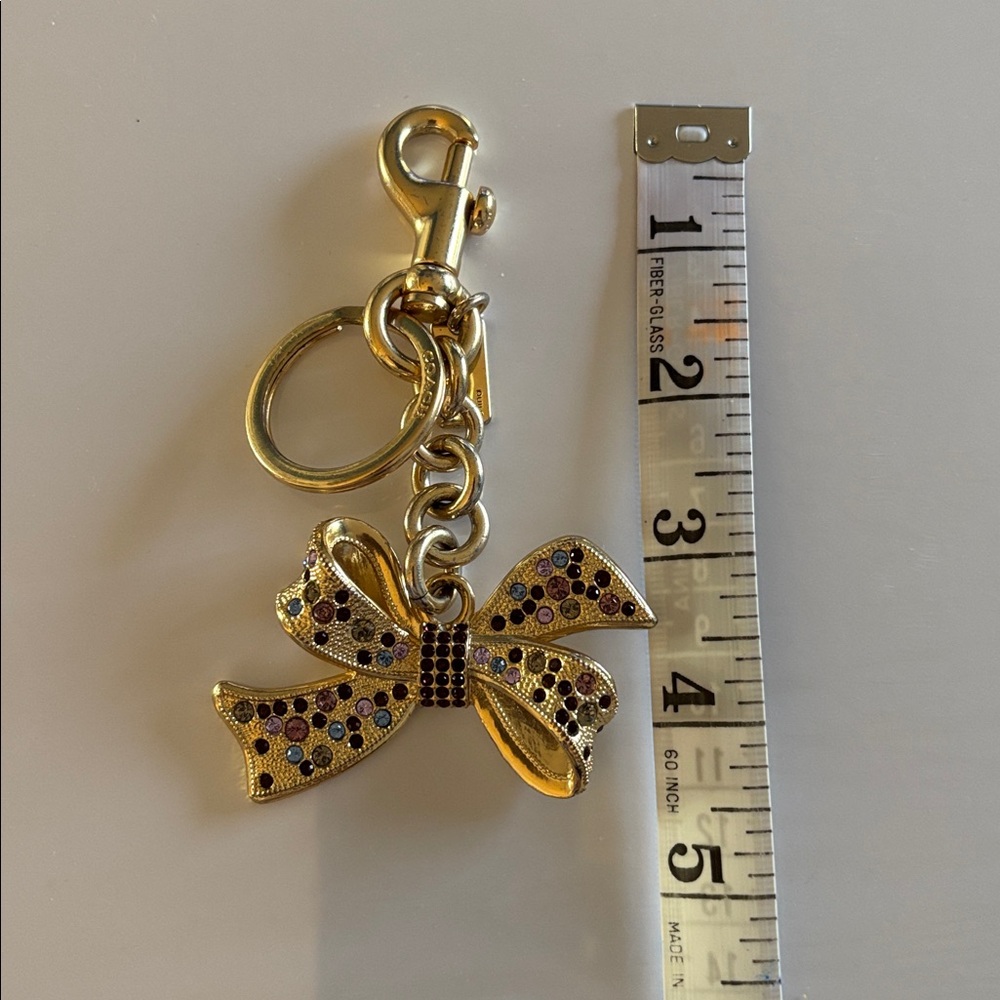 Coach Multi Stone Bow Keychain/Bag Charm—
Style F-74105 - Picture 5 of 12